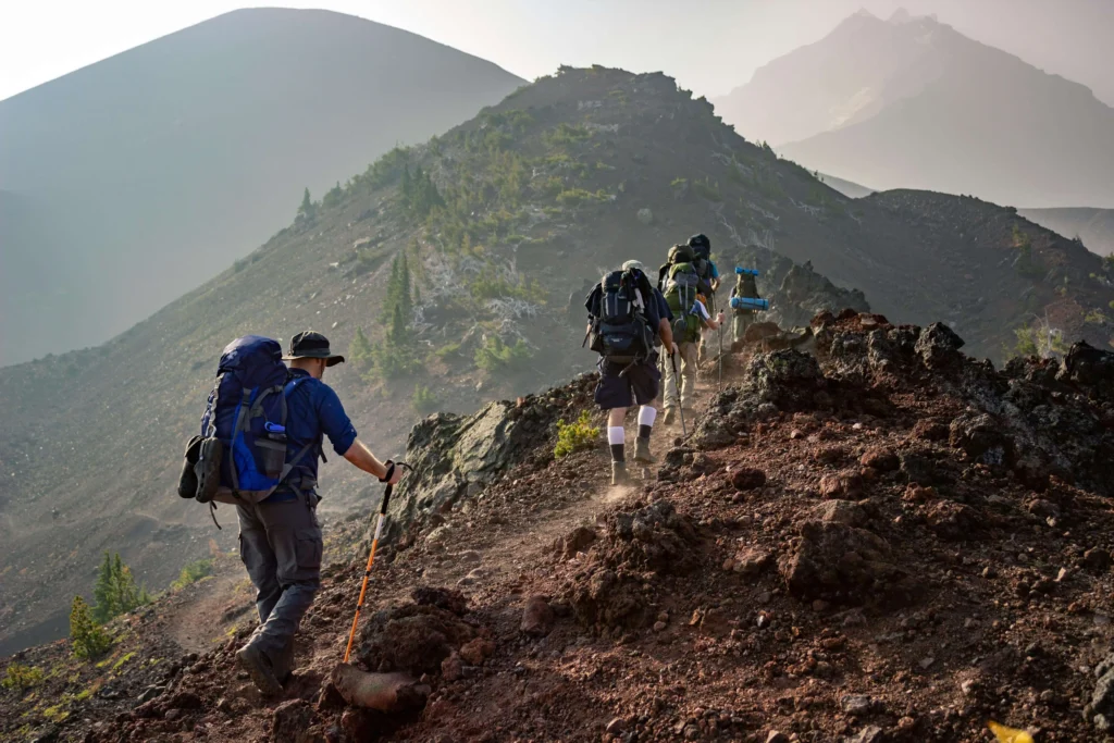 group hiking in mountains