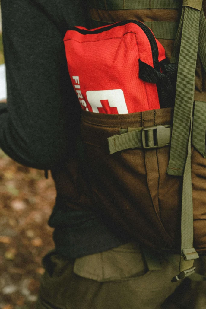 Compact hiking first aid kit and emergency gear