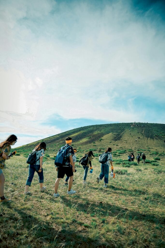 Group of hikers engaged in hot weather hiking