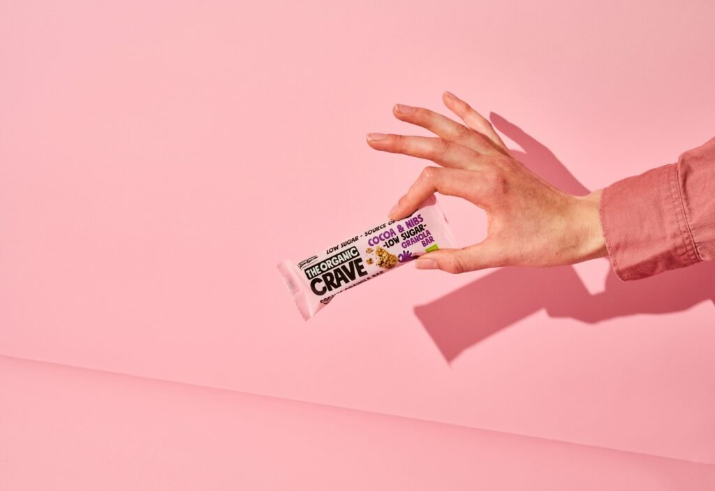 Hand grabbing Granola bar - trail snack