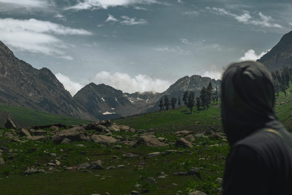 hiker looking towards a trail. Hiking Effort Score