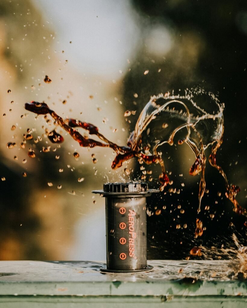 AeroPress coffee maker splashing coffee