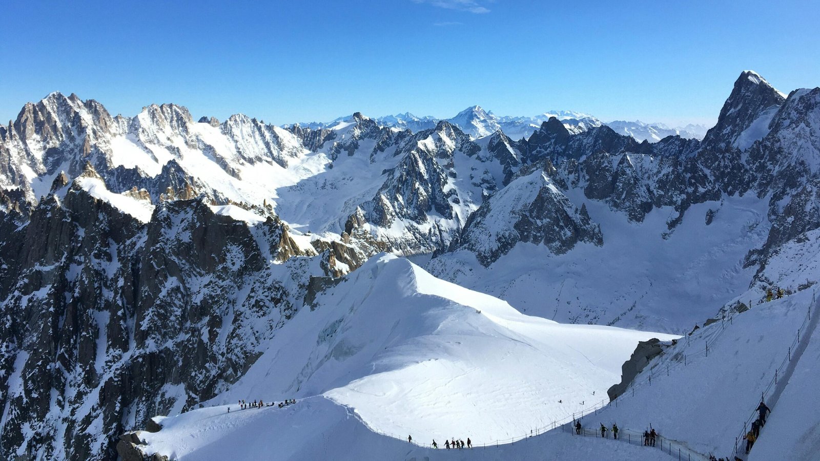 People hiking Tour du Mont Blanc (France, Italy, Switzerland)